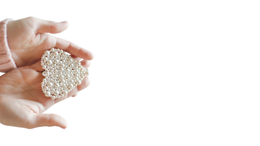 Llaverito rosa con letra N 6.99 y Besito Bag 29.99